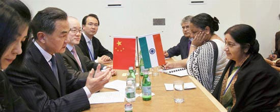 Sushma Swaraj with her Chinese counterpart Wang Yi