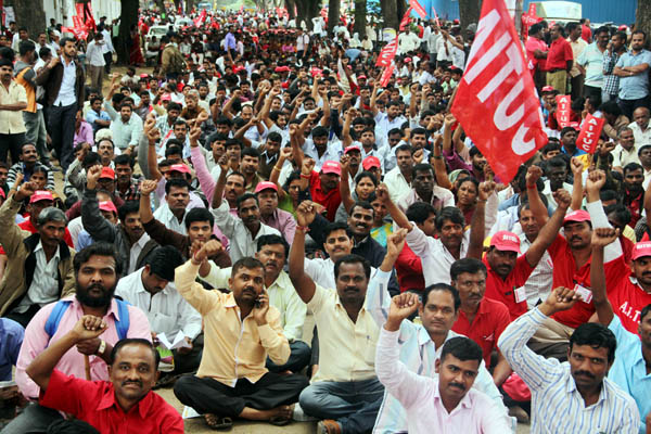 Members of AITUC protest urging the State Government for the implementation of their various demands during the Tenth Conference of AITUC Karnataka State Committee at Freedom Park in Bengaluru on Tuesday Dec 01 2015 - KPN ### Tenth Conference of AITUC Karnataka
