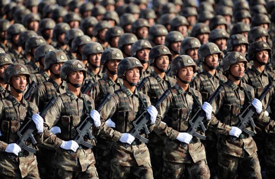 Soldiers from Chinese People's Liberation Army (PLA) Special Operations Forces march in formation during a training session at the 60th National Day Parade Village on the outskirts of Beijing in this September 15, 2009 file photo. China will beef up its military budget by 12.7 percent this year, the government said on March 4, 2011, a return to double-digit spending increases that will stir regional unease.   REUTERS/Joe Chan/Files (CHINA - Tags: MILITARY) CHINA OUT. NO COMMERCIAL OR EDITORIAL SALES IN CHINA