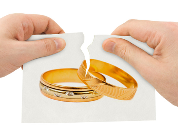 Hands tear picture with wedding rings