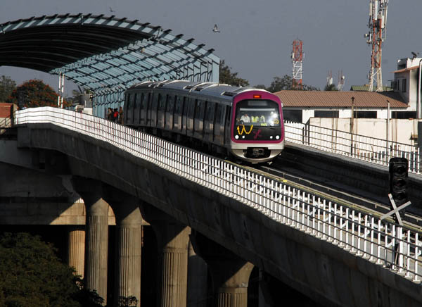 Namma Metro: Namma Metro train passing Ulsoor during a test run in Bangalore on Sunday. KPN