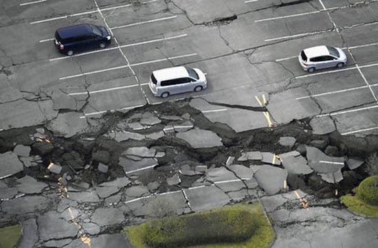 Cracks caused by an earthquake are seen in a parking lot in Minamiaso town, Kumamoto prefecture. REUTERS/Kyodo