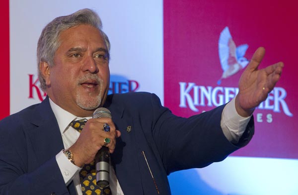Kingfisher Airlines Chairman Vijay Mallya speaks to the media during a news conference in Mumbai November 15, 2011. India's cash-strapped Kingfisher Airlines doubled its loss in the September quarter on higher fuel prices and operating costs amid investor worries about its ability to remain aloft in a fast-growing but loss-making industry.  REUTERS/Vivek Prakash (INDIA - Tags: BUSINESS TRANSPORT)