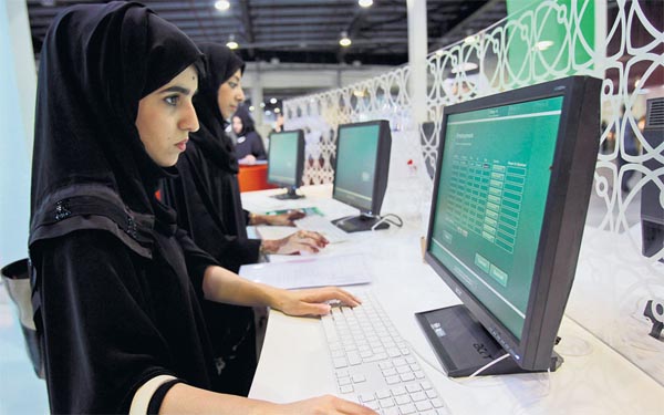Emirati talent submit applications during the Careers UAE exhibition in Dubai, March 28, 2010. Photo by Dennis B. Mallari