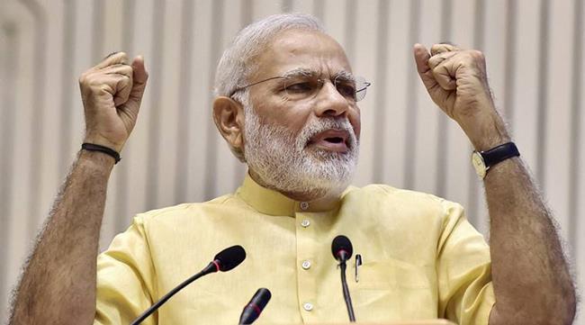 New Delhi: Prime Minister Narendra Modi gestures as he speaks at a function where he was felicitated by All India Gems and Jewellery Trade Federation (GJF) in New Delhi on Saturday.  PTI Photo by Kamal Kishore (PTI7_23_2016_000207A)